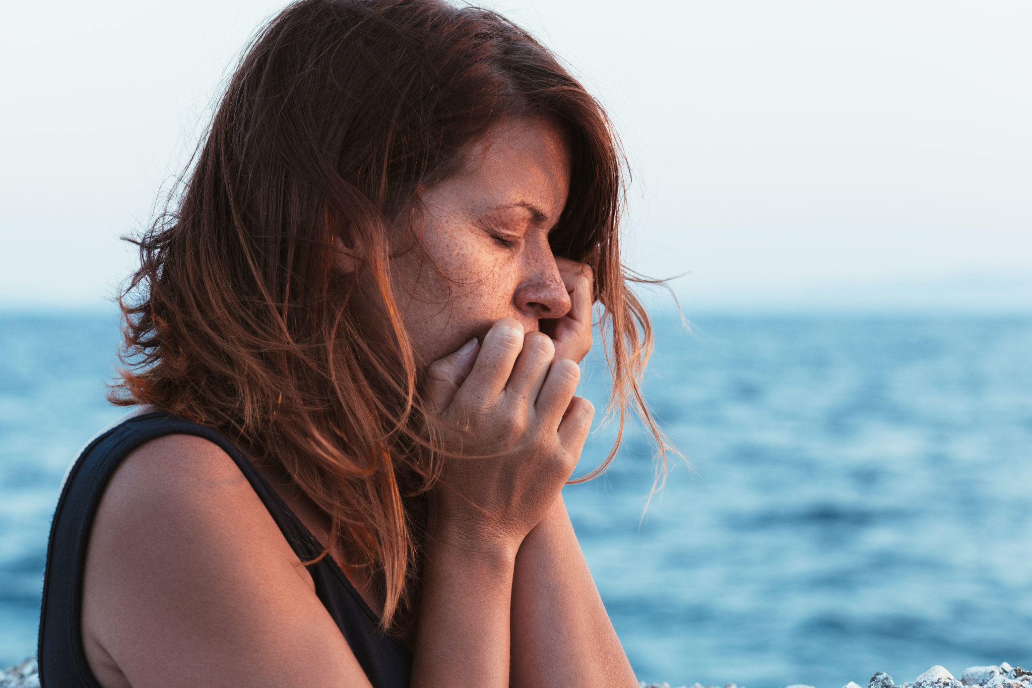 85451943 – young woman feeling sad by the sea