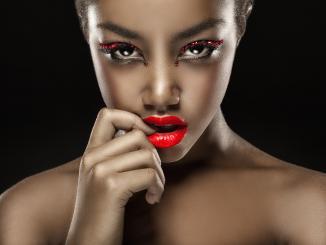 Best and most affordable Red lipcolor and red lipstick for the black or African American skins tones. How to Tips and products for different shades and colors of red.