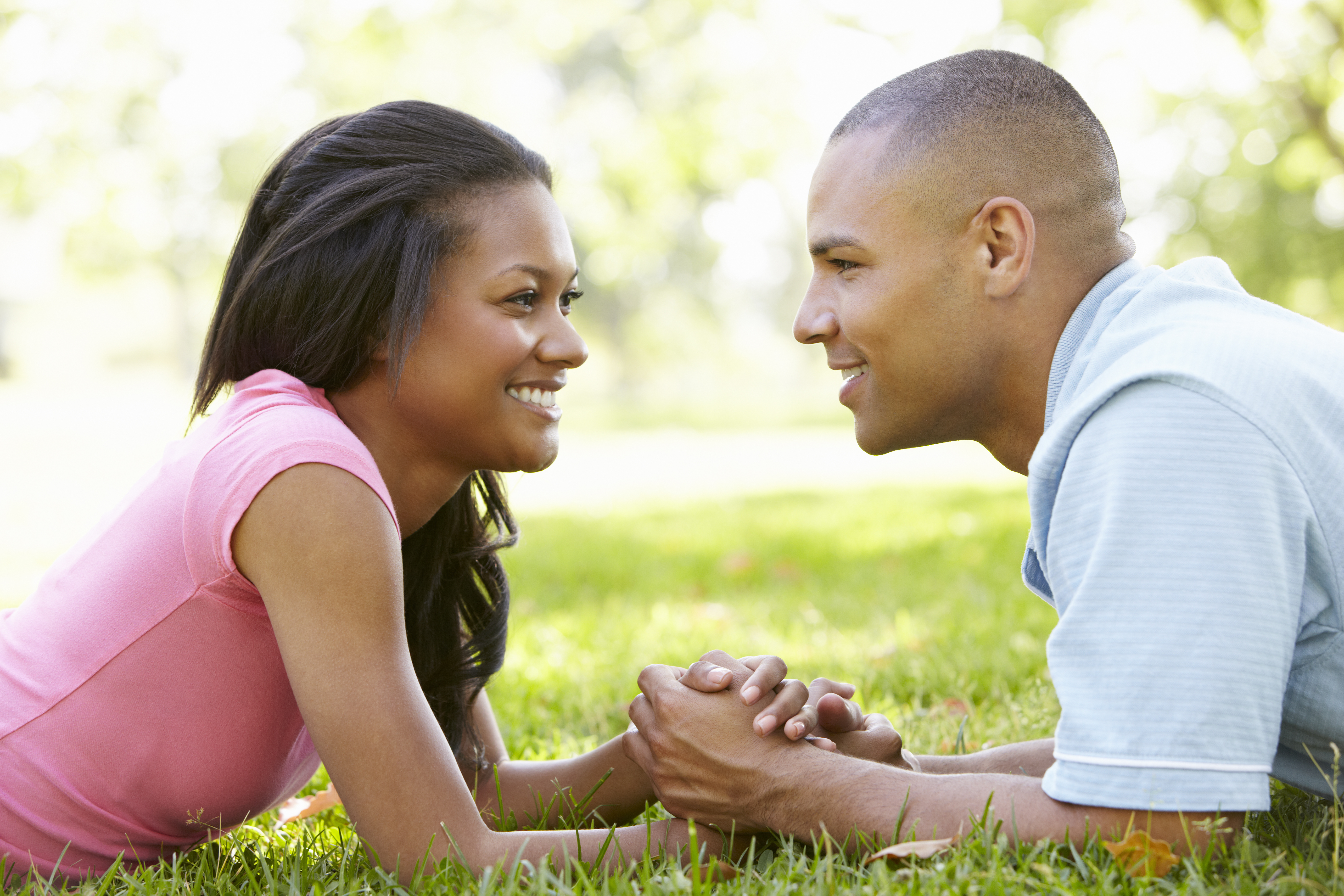 Portrait Of Romantic Young African American Couple In Park.